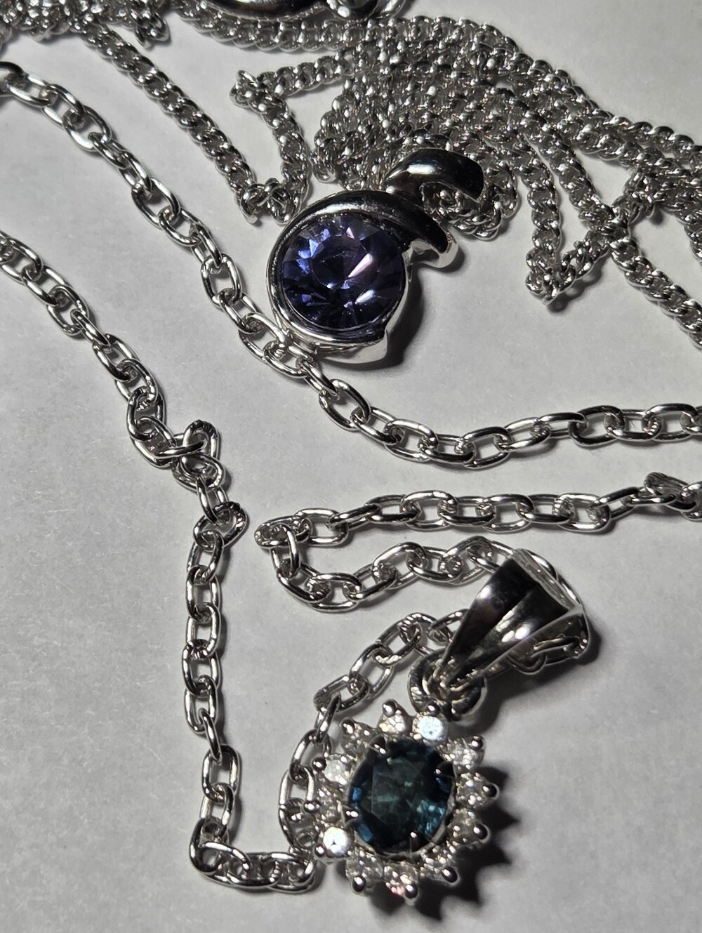 Silver-tone Pendant Necklaces (2). Costume Jewelry. Blue/Green And Purple.